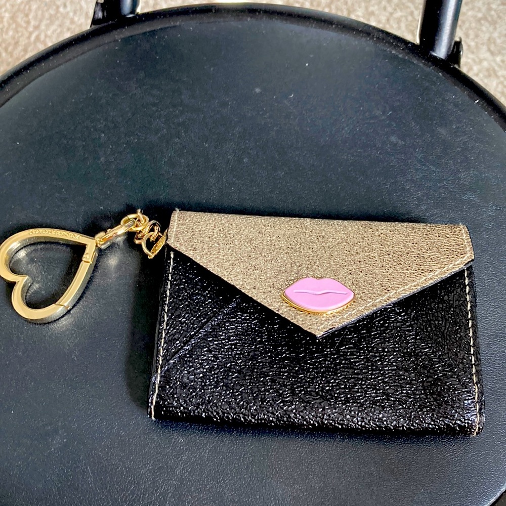 Victoria’s Secret cardholder. Barely used no markings